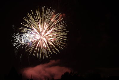 Firework display at night