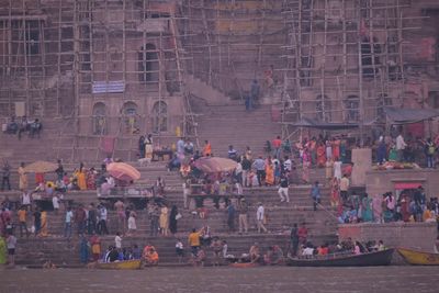 High angle view of people against buildings in city