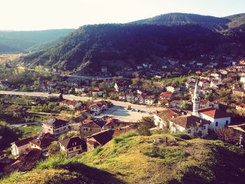 High angle view of town against mountains