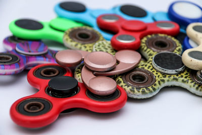 Close-up of fidget spinners on white background