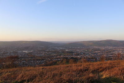 Aerial view of townscape against sky