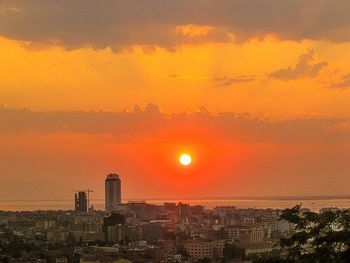 View of cityscape at sunset