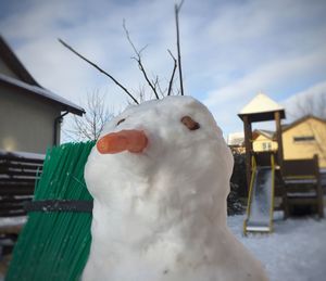 Close-up of built structure against sky