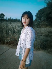 Portrait of a girl standing on land