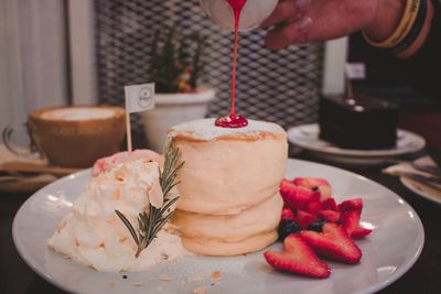 Close-up of cake served on table