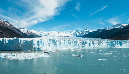 Scenic view of frozen lake against sky