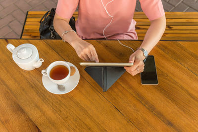 High angle view of coffee cup on table