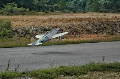 Airplane flying over land