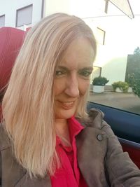 Portrait of woman in car