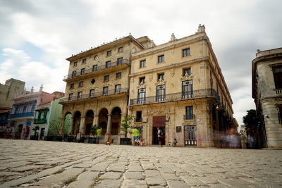 Low angle view of old town against sky