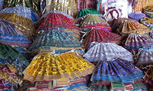 High angle view of colorful skirts for sale at market stall