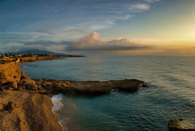 Scenic view of sea against sky during sunset