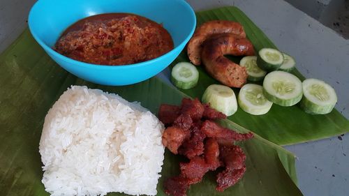 High angle view of chopped fruits and vegetables on table