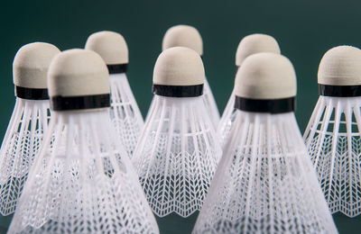 Close-up of shuttlecocks on table