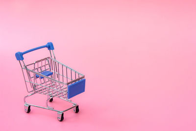 Metallic structure against pink background