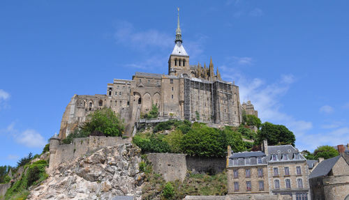 Low angle view of historic building against sky