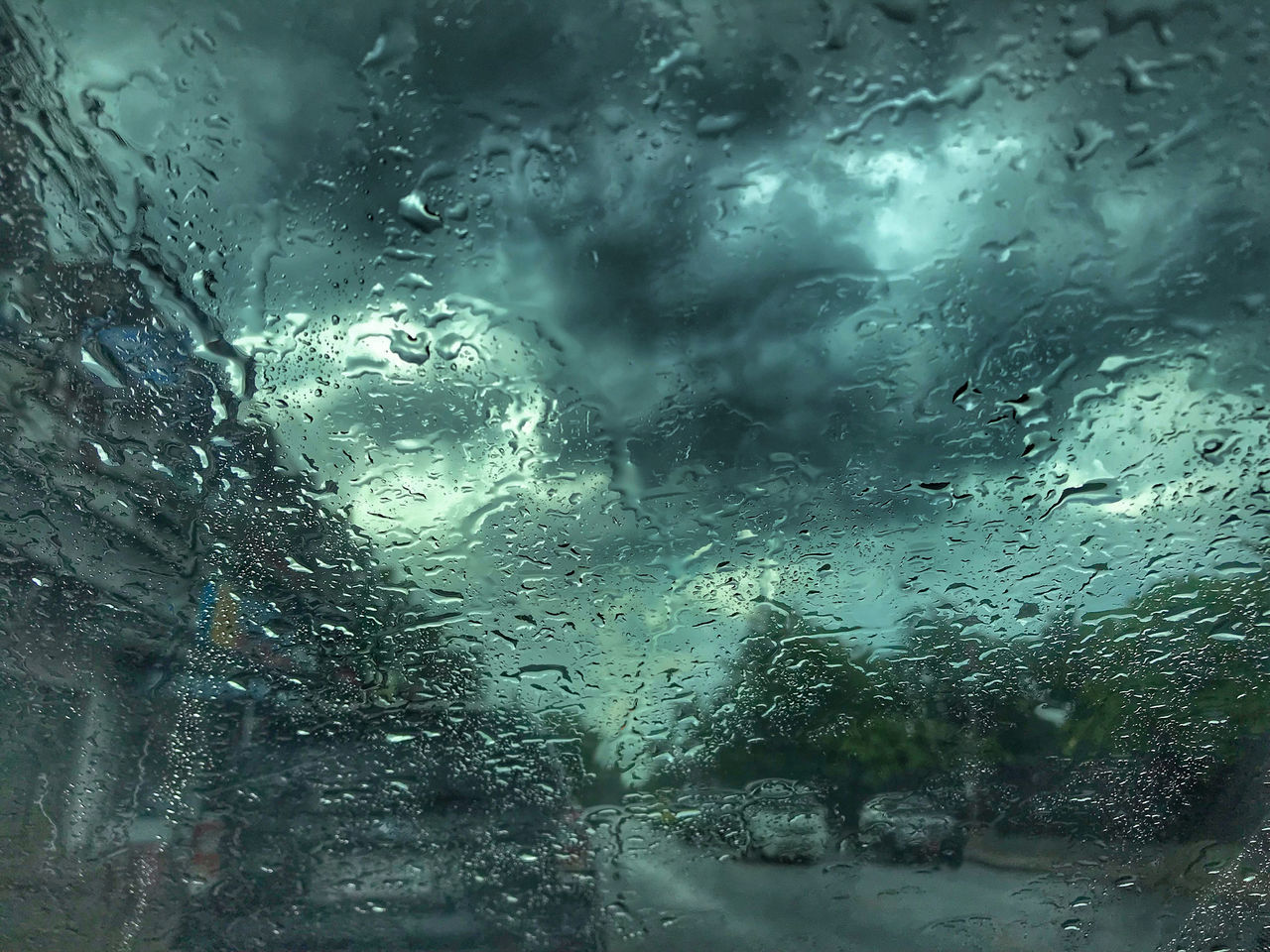 RAINDROPS ON GLASS WINDOW