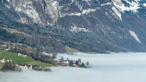 Scenic view of snowcapped mountains against sky