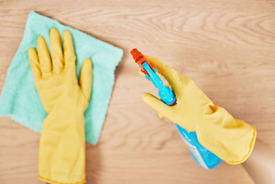 Cropped hand of woman with paint