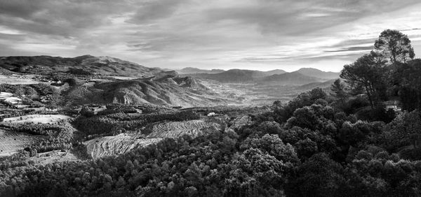 Panoramic view of landscape and mountains against sky