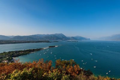 Scenic view of sea against blue sky