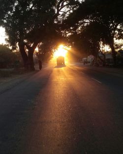 Empty road at sunset