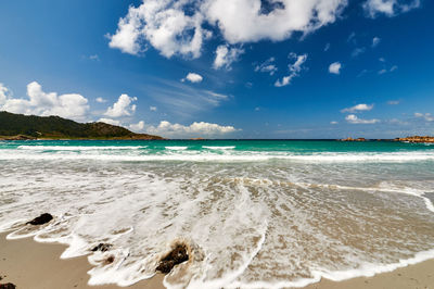 Scenic view of beach against sky