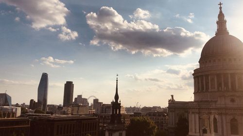 Panoramic view of buildings against sky in city