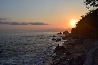 Scenic view of sea against sky during sunset