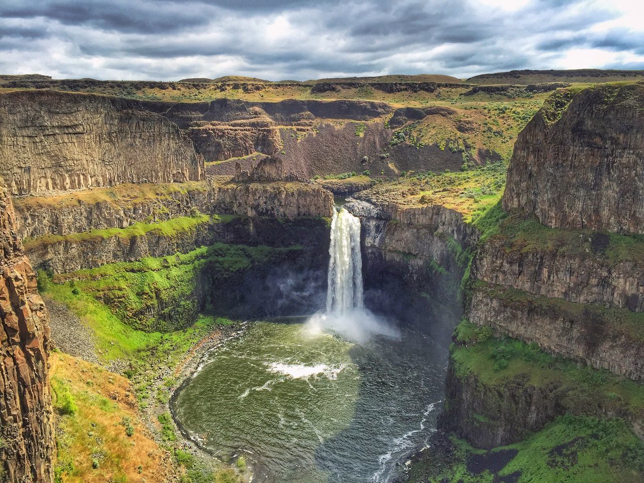 water, sky, waterfall, cloud - sky, motion, scenics, flowing water, beauty in nature, nature, long exposure, cloudy, flowing, rock - object, tranquil scene, grass, tranquility, splashing, landscape, plant, idyllic