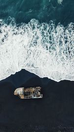 High angle view black sand beach