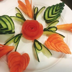 High angle view of chopped vegetables in plate