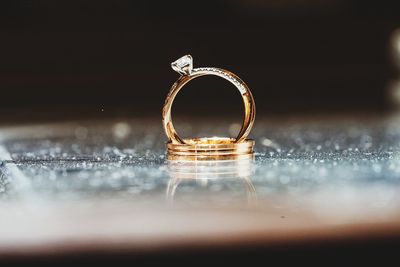 Close-up of rings on table