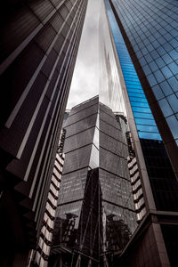 Low angle view of modern buildings against sky