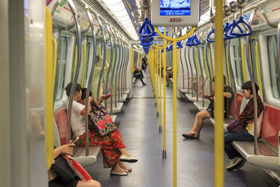 People in illuminated train