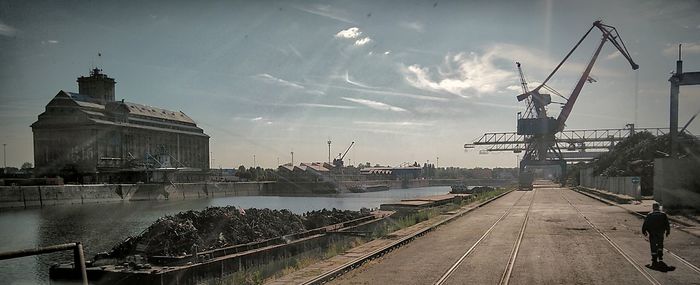 Panoramic view of harbor against sky