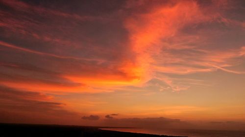Scenic view of dramatic sky during sunset