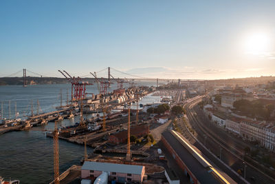 High angle view of city at sunset