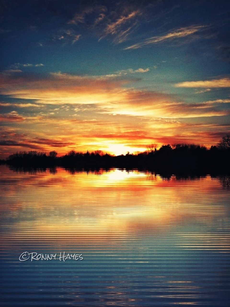 sunset, water, scenics, tranquil scene, sky, tranquility, beauty in nature, orange color, reflection, nature, cloud - sky, idyllic, lake, tree, outdoors, dusk, waterfront, no people, sea, cloud