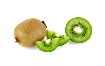 Close-up of fruits against white background