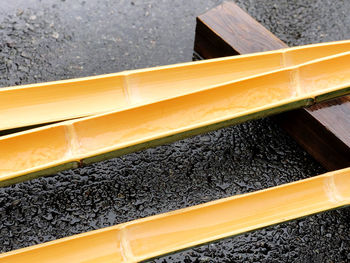 High angle view of yellow box on table