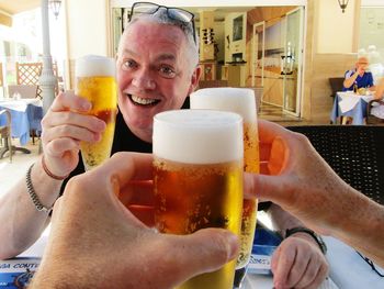 Close-up of man having food in restaurant