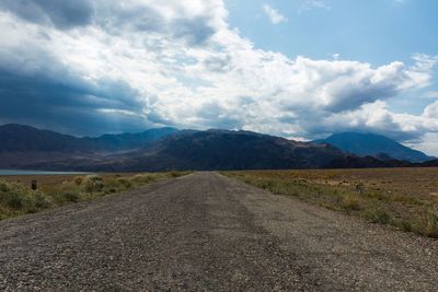 Road amidst landscape against sky