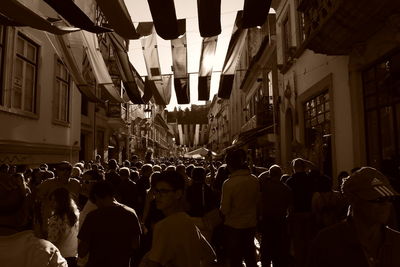 Crowd on illuminated city at night