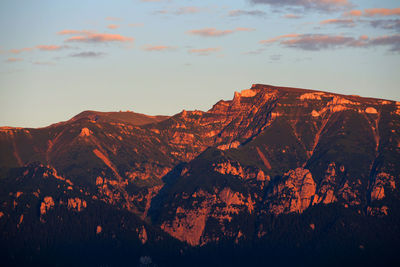 Scenic view of mountains against sky during sunset