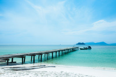 Pier over sea against sky