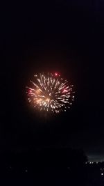 Low angle view of firework display