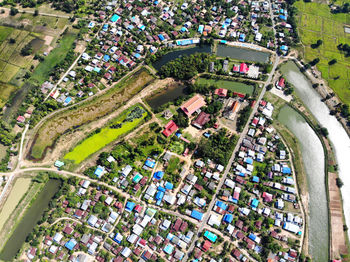 High angle view of crowd on street amidst buildings