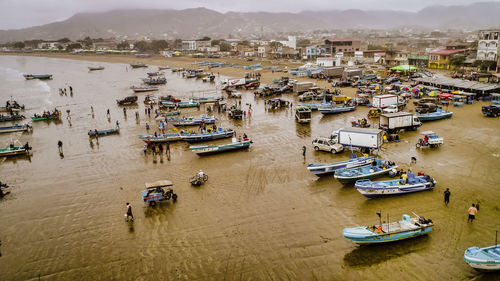 High angle view of sailboats moored in sea