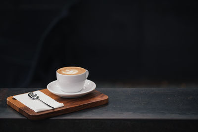 Coffee cup on table